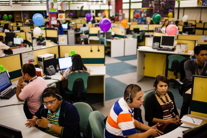 For representation only. Business process outsourcing (BPO) workers are seen busy on the floor of a call center in Metro Manila. AP