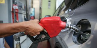 Photo for representation only. A gasoline station attendant fills up a car in Quezon City. ABS-CBN NEWS