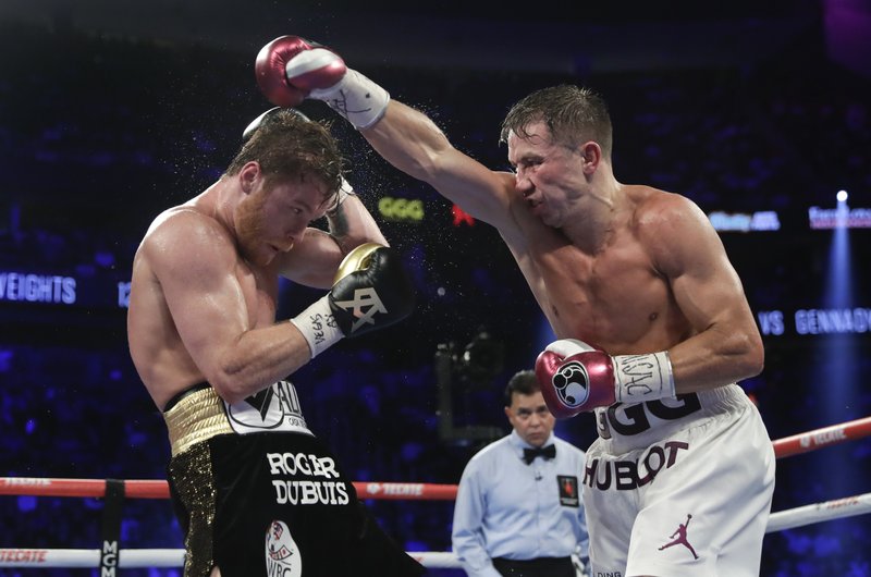 Canelo Alvarez narrowly wins middleweight title