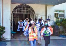 READY FOR THE ‘BIG ONE’? The medical staff of Iloilo Mission Hospital in La Paz, Iloilo City rehearse the basic earthquake response “duck, cover and hold” in preparation for today’s (Feb. 21, 2019) national simultaneous earthquake drill. IAN PAUL CORDERO/PN