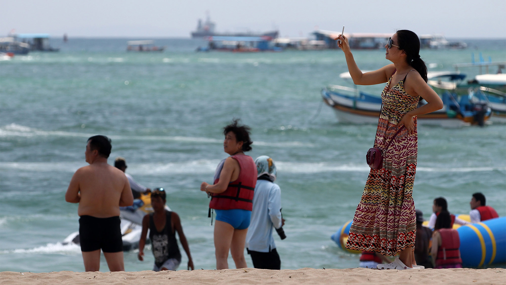 Chinese Tourist on the Beach