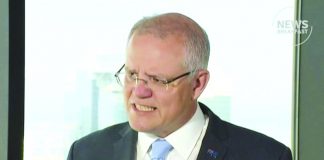 In this image made from video, Australian Prime Minister Scott Morrison speaks in Osaka, western Japan, Friday, June 28, 2019. Morrison said he remained concerned for an Australian student who is uncontactable in North Korea and has been offered international support to find him. ABC via AP