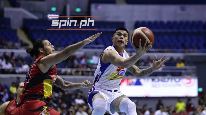 Magnolia Hotshots’ Jiovani Jalalon attempts a reverse layup after evading the defense of San Miguel Beermen’s Christian Standhardinger. SPIN.PH