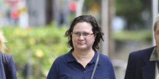 Former Honolulu deputy prosecutor Katherine Kealoha walks into federal court for a hearing to decide if she should be held while awaiting sentencing on conspiracy charges, Friday, June 28, 2019 in Honolulu. AP