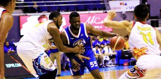 NLEX Road Warriors’ Oluseyi Ashaolu attacks the defense of Rain or Shine Elasto Painters’ Denzel Bowles. TIEBREAKER TIMES PHOTO