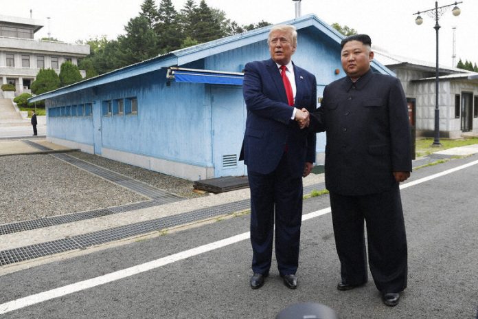 American President Donald Trump meets with North Korean leader Kim Jong-un at the border village of Panmunjom in the Demilitarized Zone, South Korea on June 30, 2019. AP