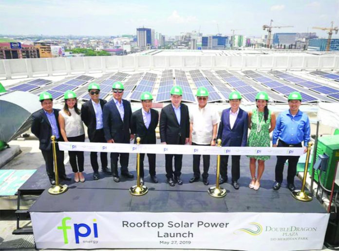 Photo shows officers of First Philippines Holdings Federico Piki Lopez, Victor Lito Santos Jr., Chinie Defensor, Ariel Villasenor and Carlo Vega with DD Meridian Park Officers Amb. Benedicto Yujuico, Hannah Yulo, Edgar Injap Sia II, Ferdinand Sia and Tony Tan Caktiong during the unveiling event. DOUBLEDRAGON