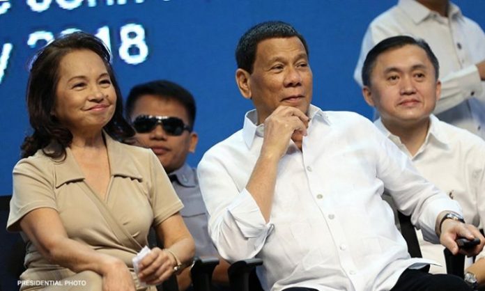 President Rodrigo Duterte chats with outgoing House Speaker Gloria Arroyo, in this April 9, 2018 photo. Duterte recently claimed that he has killed someone, thinking Arroyo – who was then president – will like it. PRESIDENTIAL PHOTO