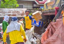 Commissioned personnel of J.S Layson & Co., Inc. collect garbage of residents in Barangay Burgos-Mabini, La Paz, Iloilo City on Tuesday morning. Republic Act 9003, or the Ecological Solid Waste Management Act of 2000, mandates local government units to adopt proper segregation, collection, transport, storage, treatment, and disposal of solid waste through the formulation and adoption of the best environmental practices. IAN PAUL CORDERO/PN