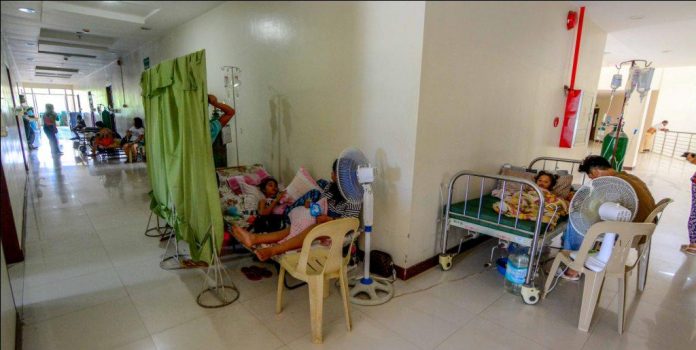 SPILLOVER PATIENTS. Patients occupy the corridors of the Iloilo Provincial Hospital in Pototan, Iloilo. Gov. Arthur Defensor Jr. has sought the help of private hospitals in Iloilo City as dengue cases continue to rise. The Provincial Health Office’s latest figures: 5,435 cases with 20 deaths. IAN PAUL CORDERO/PN