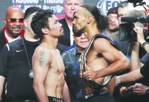 WHO WILL BLINK FIRST? Manny Pacquiao and Keith Thurman stare at each other after their weigh in yesterday in Las Vegas, Nevada, USA. AP