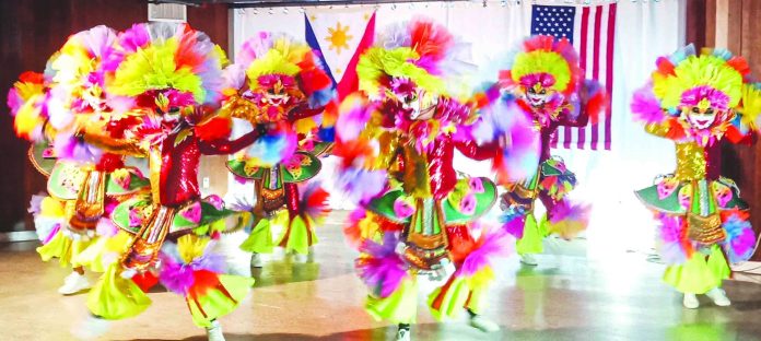 MassKara Festival dancers perform at San Francisco Filipino Cultural Center (SFFCC) in San Francisco, California, USA on July 27. Councilor Em Ang, head of the MassKara delegation, said the dance team is the first foreign group to perform at the SFFCC after its re-opening. BACOLOD CITY PIO