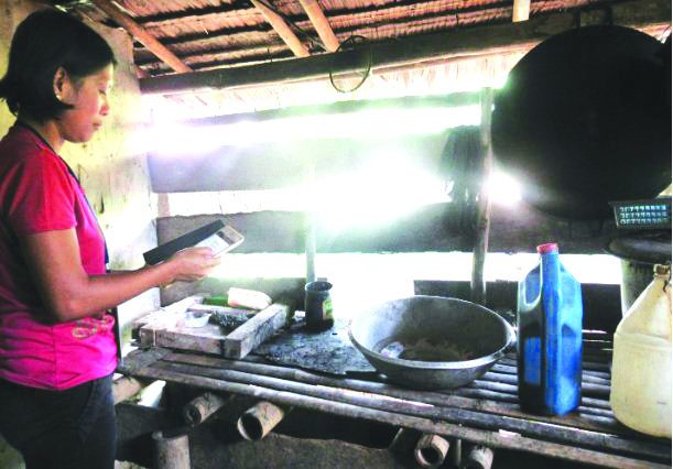 Researcher of the Philippine Statistics Authority inspects handwashing facility of one of the sample households during the conduct of survey in Barangay Singay, Madalag, Aklan. PSA AKLAN