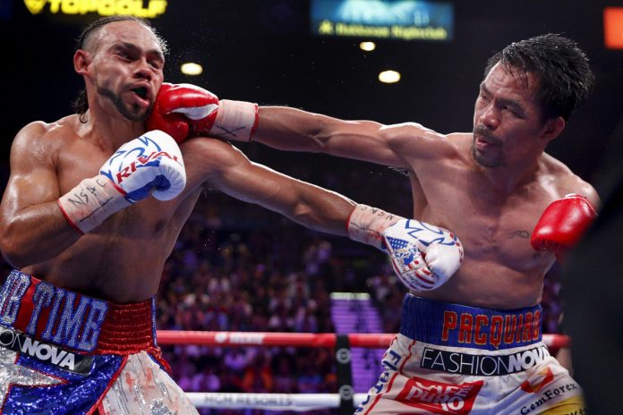 Manny Pacquiao lands a punch on Keith Thurman during his points victory over the defending welterweight champion. AP