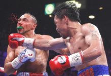 BIG BLOW. Keith Thurman connects with a shot to the face of Manny Pacquiao during Round 6 of their WBA super welterweight world championship fight in the MGM Grand Garden Arena in Las Vegas, Nevada, USA. L.E. BASKOW, LAS VEGAS REVIEW-JOURNAL