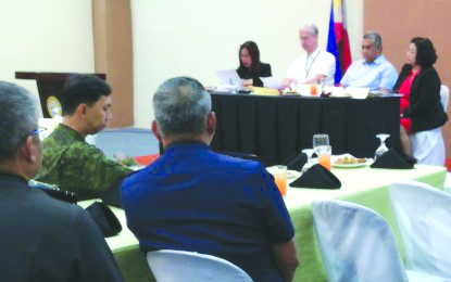 Negros Occidental Gov. Eugenio Jose Lacson (3rd from right) presides over the joint meeting of the Provincial Development Council and the Provincial Peace and Order Council at the Capitol-owned Negros First Residences on Aug. 27. The two bodies unanimously approved a joint resolution for the creation of the Provincial Task Force on Ending Local Communist Armed Conflict. PNA