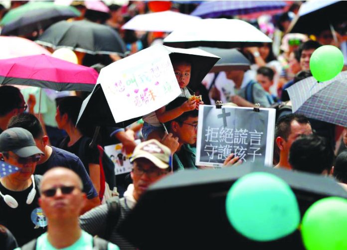 Family members participate in a protest rally titled “Guard Our Children's Future” at Edinburgh Place in Hong Kong, China, August 10, 2019. REUTERS