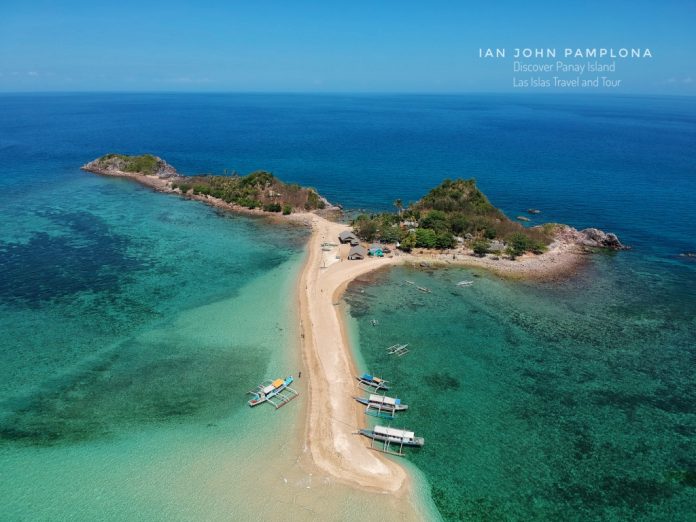 HUNGER IN PARADISE. This is one of several small islands in the Islas de Gigantes, an island chain in the municipality of Carles, Iloilo. Almost a week of inclement weather has prevented some 200 tourists from leaving the island chain, a fledgling tourist attraction that boasts of white sand beaches and pristine waters. IAN JOHN PAMPLONA/PN