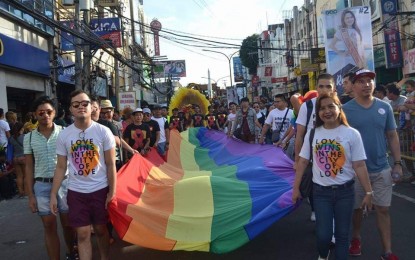 Members of the lesbian, gay, bisexual, transgender and questioning (LGBTQ) community march on the streets of Iloilo City. An Iloilo board member on Tuesday filed an ordinance allowing a “special day” for the LGBTQ+ community in the province. ILOILO PRIDE TEAM