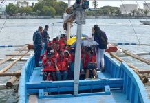 WEARING LIFEJACKET IS A MUST. Philippine Coast Guard personnel make sure the passengers of this Guimaras-bound motorboat are wearing lifejackets before leaving the Iloilo Ferry Terminal. Passengers should wear lifejackets at all times throughout the voyage, according to the Maritime Industry Authority. IAN PAUL CORDERO/PN