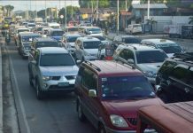 Vehicles are constantly “bumper to bumper” and slow on Sen. Benigno Aquino Jr. Avenue in Barangay Ungka II, Pavia, Iloilo due to congestion. IAN PAUL CORDERO/PN