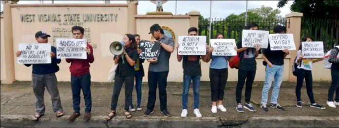 IS STUDENT ACTIVISM A CRIME? Students of West Visayas State University in Iloilo City stage a picket on Aug. 23, 2019 denouncing the planned deployment of government security forces in schools. Just this Aug. 20, students of the University of the Philippines Visayas in Miag-ao, Iloilo staged a walkout against the plan. IAN PAUL CORDERO/PN