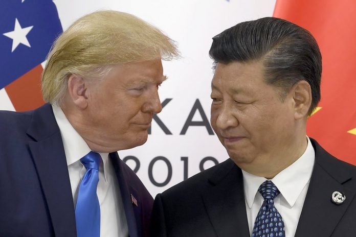 In this Jun. 29, 2019 photo, President Donald Trump, left, meets with Chinese President Xi Jinping during a meeting on the sidelines of the G-20 summit in Osaka, Japan. China has announced it will raise tariffs on $75 billion of U.S. products in retaliation for President Donald Trump’s planned Sept. 1 duty increase in a war over trade and technology policy. AP