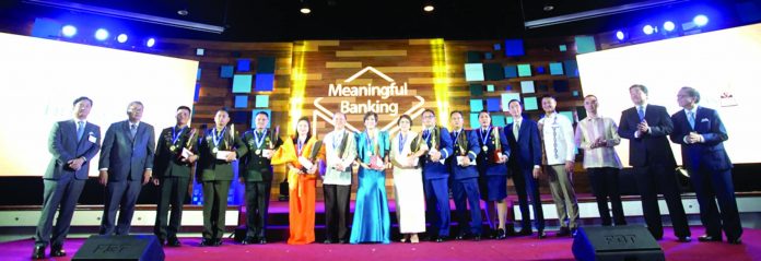 2019 METROBANK FOUNDATION OUTSTANDING FILIPINOS. Each awardee receives a golden medallion, “The Flame” trophy and P1 million cash prize in a ceremony on Sept. 4, 2019 at the Metrobank Plaza Auditorium, Makati City. Among present during the awarding were Metrobank Foundation (MBFI) trustee and Federal Land chairman Alfred Ty (extreme left), Supreme Court of the Philippines associate justice Hon. Alexander Gesmundo (2nd from left), MBFI chairman Arthur Ty (5th from right), Senator Sherwin Gatchalian (4th from right), House of Representatives Speaker Alan Peter Cayetano (3rd from right), Metrobank president Fabian Dee (2nd from right) and MBFI president Aniceto Sobrepeña (extreme right).