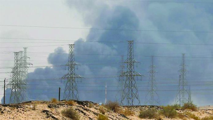 Smoke is seen following a fire at an Aramco facility in Abqaiq, Saudi Arabia, home to the world’s largest oil processing plant. REUTERS