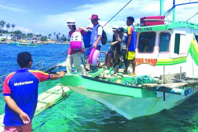 These wooden-hulled passenger boats are the main transportation mode between Caticlan to Boracay Island in Malay, Aklan. The boat cooperative in the world-famous island will impose a fare hike starting October. BOY RYAN ZABAL/AKEAN FORUM