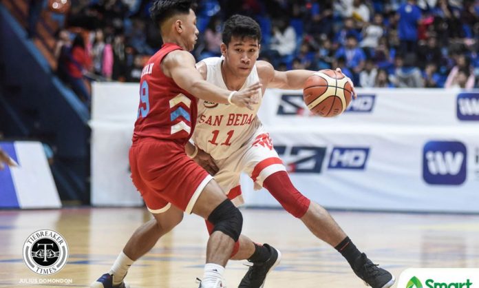 Ilonggo Clint Doliguez of San Beda University Red Lions attacks an Emilio Aguinaldo College Generals defender. TIEBREAKER TIMES PHOTO