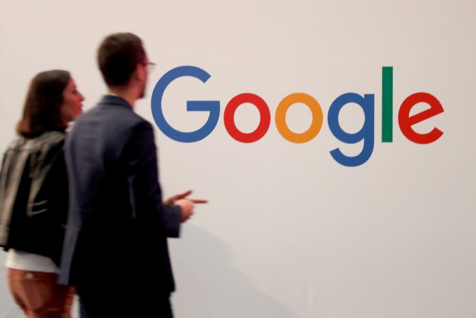 Visitors pass by the logo of Google at the high profile startups and high tech leaders gathering, Viva Tech, in Paris, France May 16, 2019. REUTERS