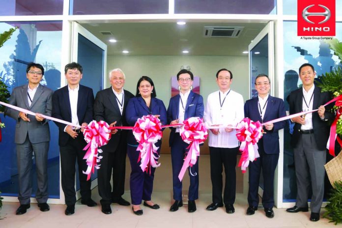 (From left) Kajima executive president Keisuke Koshijima, Marubeni Corporation Jiro Itai, Hino Motors Philippines (HMP) chairman Vicente T. Mills, Jr., Board of Investments executive director Corazon Dichosa, HMP president Mitsuharu Tabata, Honorable Ambassador Koji Haneda, Hino Motors, Ltd. chairman Yasuhiko Ichihashi, Hino Motors, Ltd. general manager Hiroshi Aoki. Key executives from Hino Motors Philippines Corp., Hino Motors, Ltd., Marubeni, Kajima, and honorary guests lead the ribbon-cutting ceremony to officially open Hino’s Training Support and Technical Service Center.