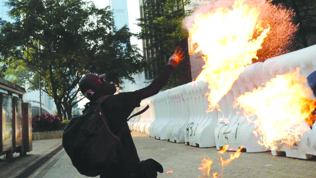 Some protesters threw petrol bombs as violence broke out near government offices in Hong Kong on Sept. 16, 2019. REUTERS