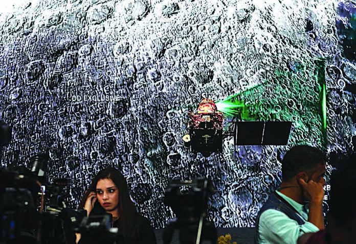 A video on Chandrayaan 2 India's Moon mission is projected on the LED wall at the media centre at Indian Space Research Organization (ISRO) Telemetry Tracking and Command Network (ISTRAC) Command Centre in Bangalore, India, Sept. 6, 2019. EPA/JAGADEESH NV