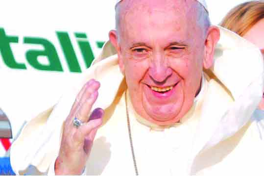 Pope Francis waves as he departs Fiumicino Airport to begin his visit to the African nations of Mozambique, Madagascar and Mauritius, in Rome, Italy Sept. 4, 2019. REUTERS