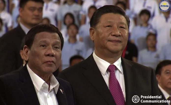 President Rodrigo Duterte (left) and Chinese President Xi Jinping attend the opening ceremonies of the 2019 FIBA World Cup on Friday. Duterte expressed his support on China about the political unrest in Hong Kong during his bilateral meeting with Xi. PCOO