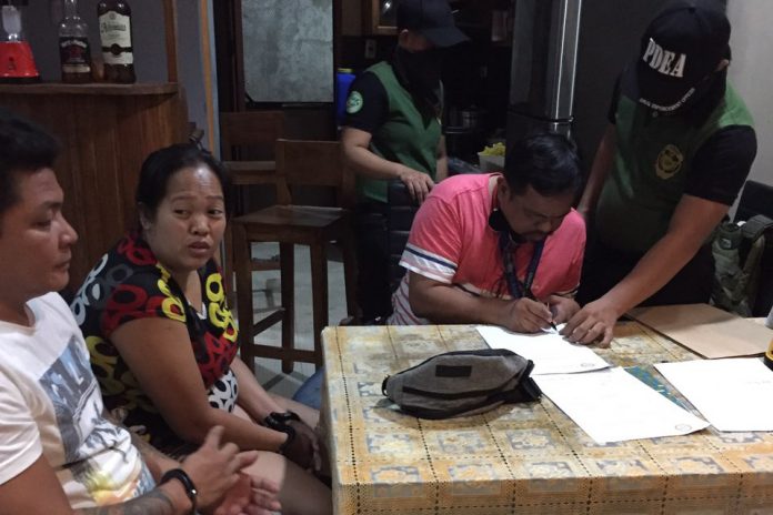 Agents of the Philippine Drug Enforcement Agency conduct an inventory of the suspected shabu seized from couple Randy and Duckin Hamantoc. PDEA-6