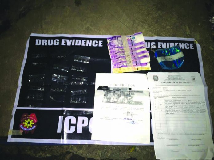 Police seized these sachets suspected shabu and marked money from “high-value” target Russel Ajeto. IAN PAUL CORDERO/PN