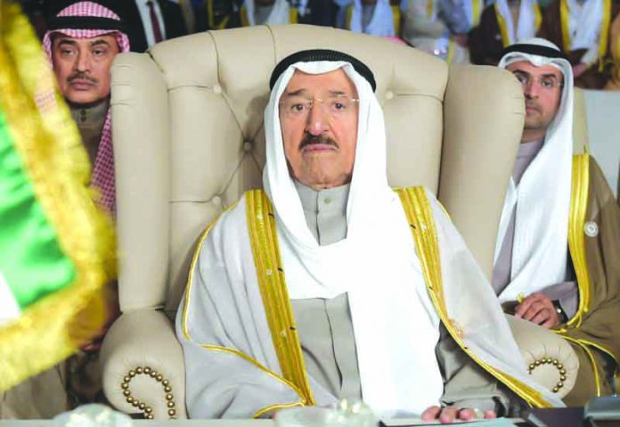 In this March 31, 2019 file photo, Kuwait's ruling emir, Sheikh Sabah Al Ahmad Al Sabah, attends the opening of the 30th Arab Summit, in Tunis, Tunisia. Kuwait said Sunday, Sept. 8, 2019, that its 90-year-old ruling emir Sheikh Sabah has been admitted to a U.S. hospital after an earlier health scare. AP