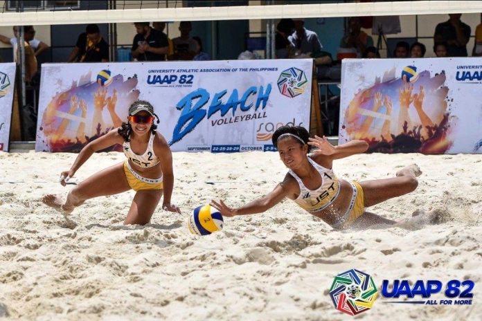 University of Santo Tomas Golden Tigresses’ Babylove Barbon and Gen Eslaplor fails to save the ball. UAAP PHOTO