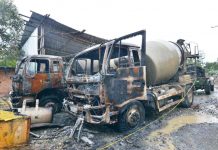 These cement mixers of a construction company were torched by suspected rebels in Guimbal, Iloilo late night on Wednesday, Sept. 11, 2019. Police investigators believed the company resisted the rebels’ extortion attempts. IAN PAUL CORDERO/PN