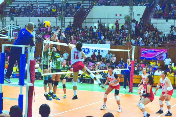 Players of PacificTown Army Lady Troopers fail to block the ball from the volley of Petro Gazz Angels’ Jonah Sabete at the University of San Agustin Gym in Iloilo City. IAN PAUL CORDERO/PN