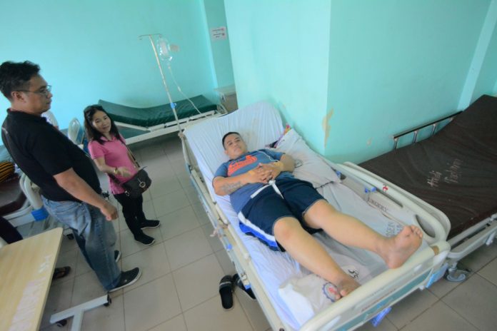 Wounded media practitioner and Panay News correspondent Stephen Louie Checa at the Angel Salazar Memorial General Hospital after sustaining a gunshot wound on the left shoulder. He survived the fatal shooting inside a computer shop in Barangay Atabay, San Jose, Antique around 7 a.m. on Monday. IAN PAUL CORDERO/PN