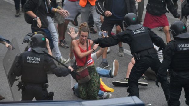 Violent clashes erupt outside the airport in Barcelona, Spain on Monday. AFP