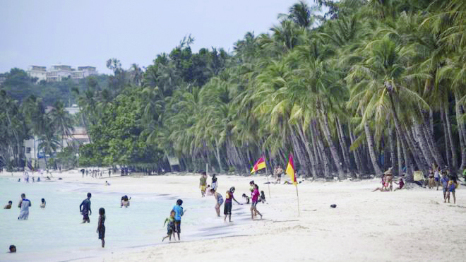 San Miguel Corporation is pushing for the construction of a bridge which would cost more than P4.4 billion and would connect Caticlan to Boracay Island. REUTERS