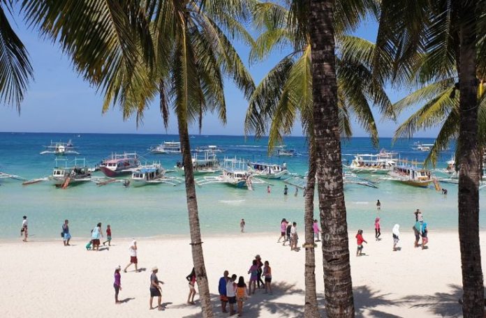 Tourists are seen in Boracay Island, Malay. Aklan. Recently, the municipal police station urged tourists in this world-famous island to be vigilant in the upcoming surge of holidaymakers. PN FILE PHOTO