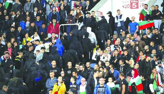 Bulgarian fans leave the stadium during the Euro 2020 group A qualifying soccer match between Bulgaria and England, at the Vasil Levski national stadium, in Sofia, Bulgaria on Oct. 14, 2019. AP