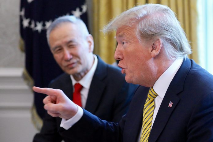 United States president Donald Trump speaks while meeting with China’s vice premier Liu He in the White House Oval Office, April 4. Asian markets rallied Monday after China and the United States said they were close to agreeing a mini trade deal, but the pound extended losses on fresh Brexit uncertainty while European Union leaders consider extending a deadline for Britain to leave the bloc. JONATHAN/ERNST REUTERS