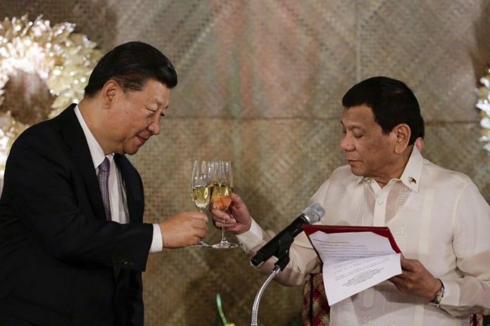 President Rodrigo Duterte and visiting Chinese President Xi Jinping toast to stronger friendship during a state banquet at Malacanang. The two leaders both signed a memorandum of understanding on cooperation on oil and gas development in the West Philippine Sea. AP